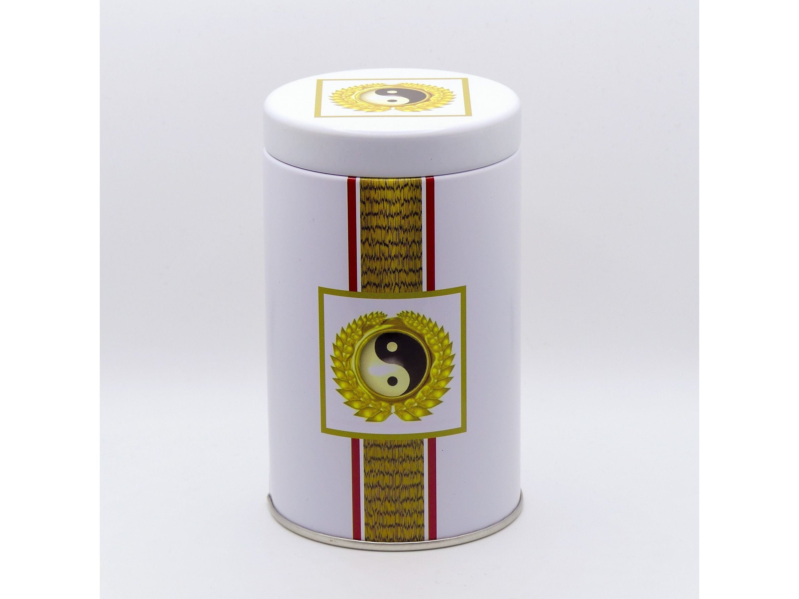 Bezaubernde Teedose mit Yin-Yang-Symbol